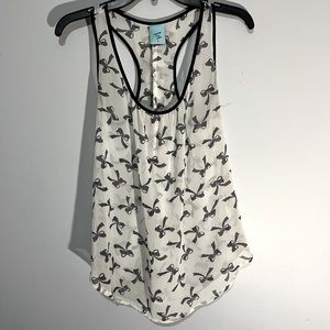 Racerback sheer tank with bow print. I like the ruffles on the back. Fits XS/S